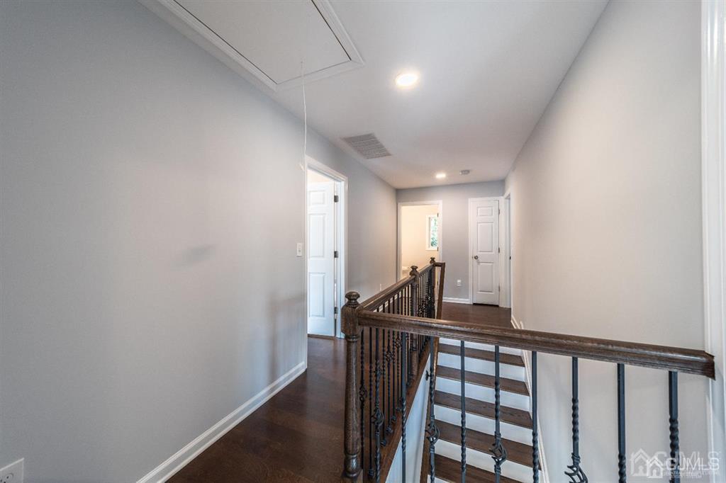107 Winthrop Road Edison, NJ 08817 - Photo 21 of 38 a view of a hallway with a chair