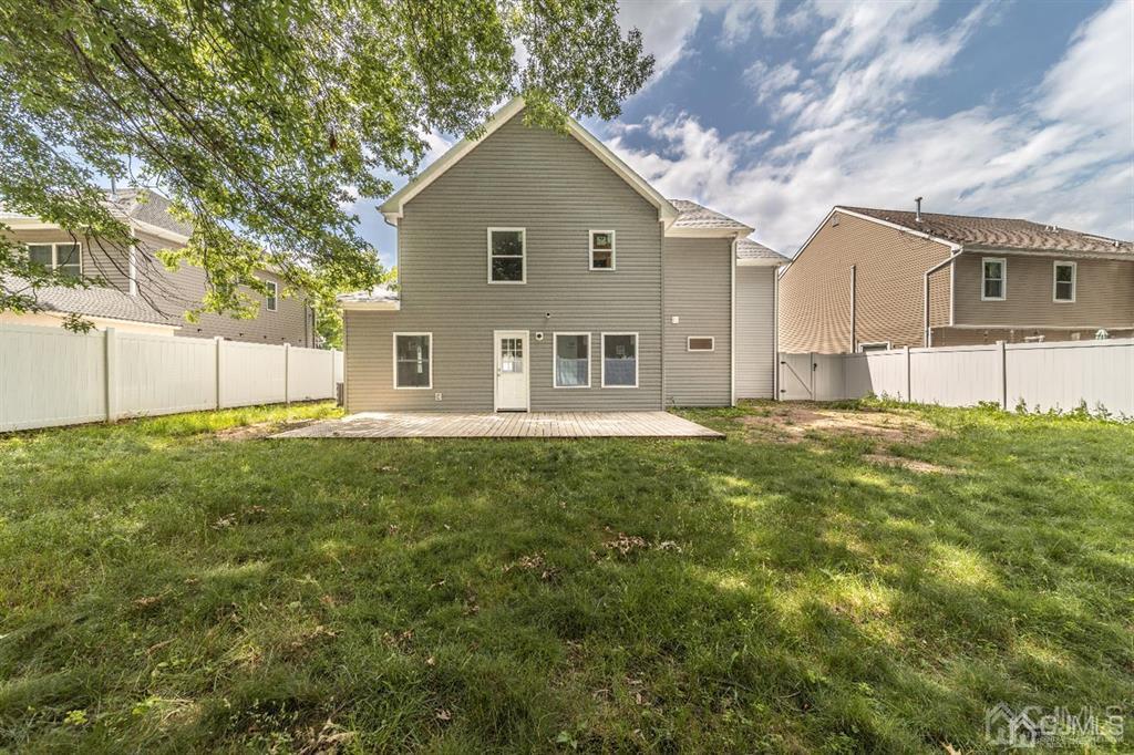 107 Winthrop Road Edison, NJ 08817 - Photo 36 of 38 a front view of a house with a yard