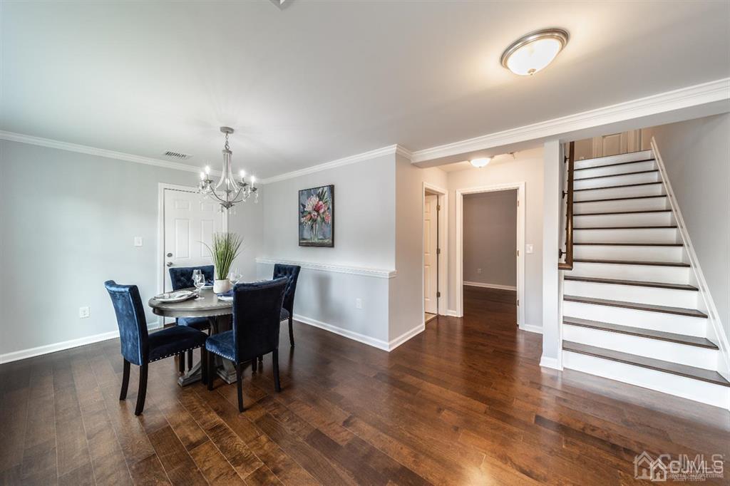 107 Winthrop Road Edison, NJ 08817 - Photo 4 of 38 a view of a dining room with furniture and wooden floor