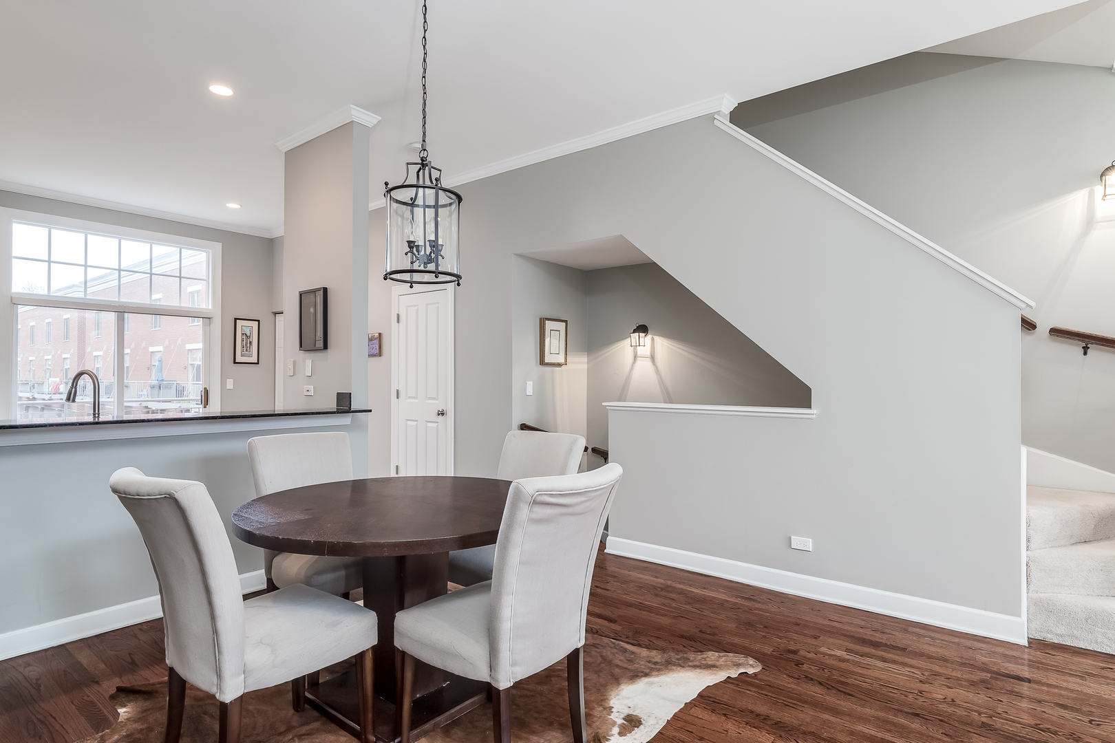 847 North May Street Chicago, IL 60642 - Photo 11 of 32 a view of a dining room with furniture and wooden floor