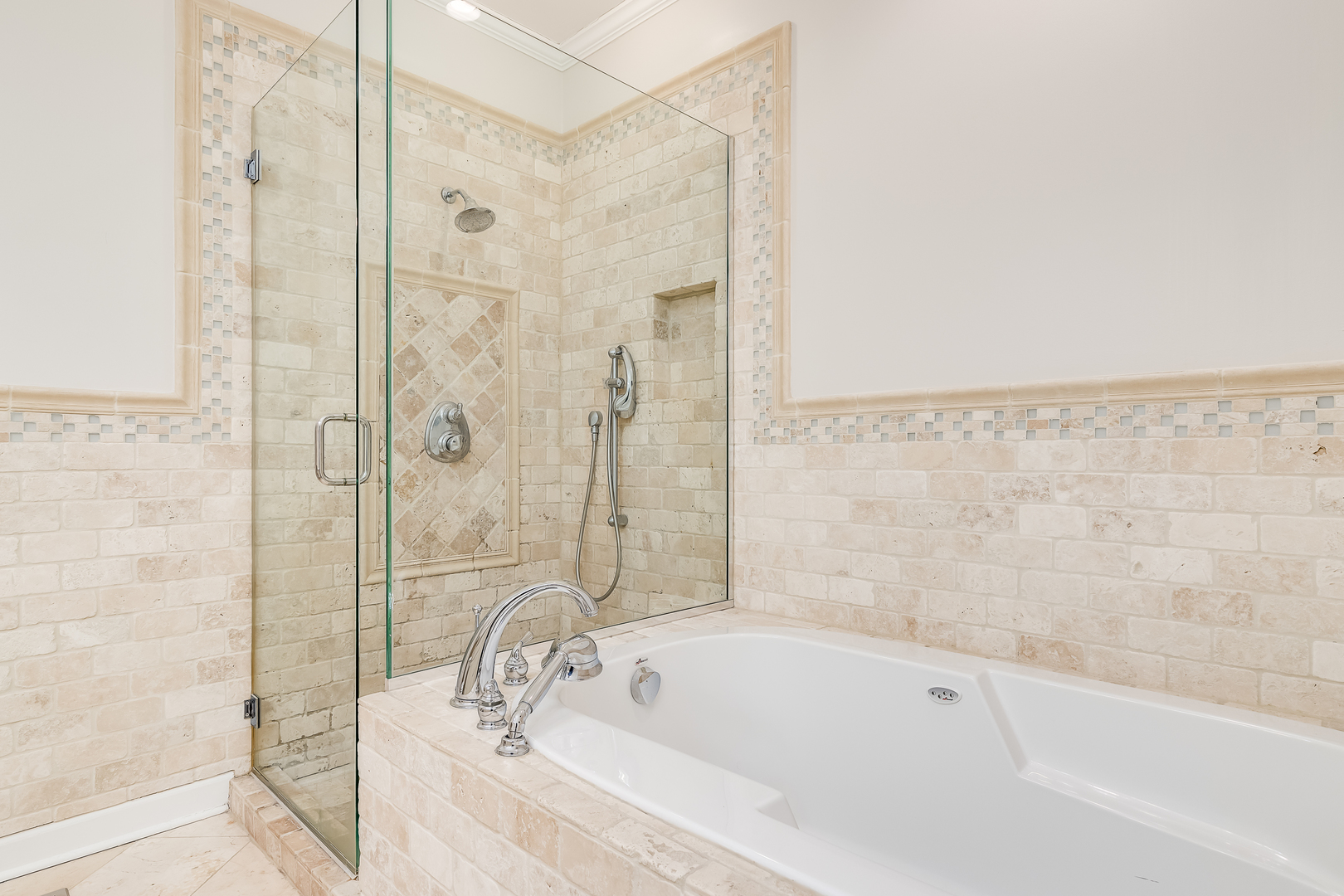 847 North May Street Chicago, IL 60642 - Photo 22 of 32 a bathroom with a bathtub and shower