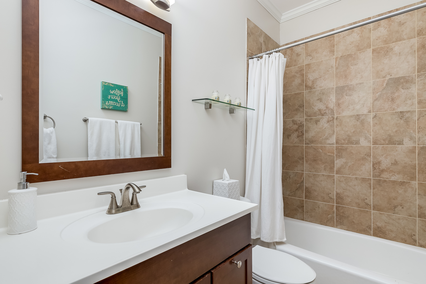 847 North May Street Chicago, IL 60642 - Photo 25 of 32 a bathroom with a sink toilet and shower
