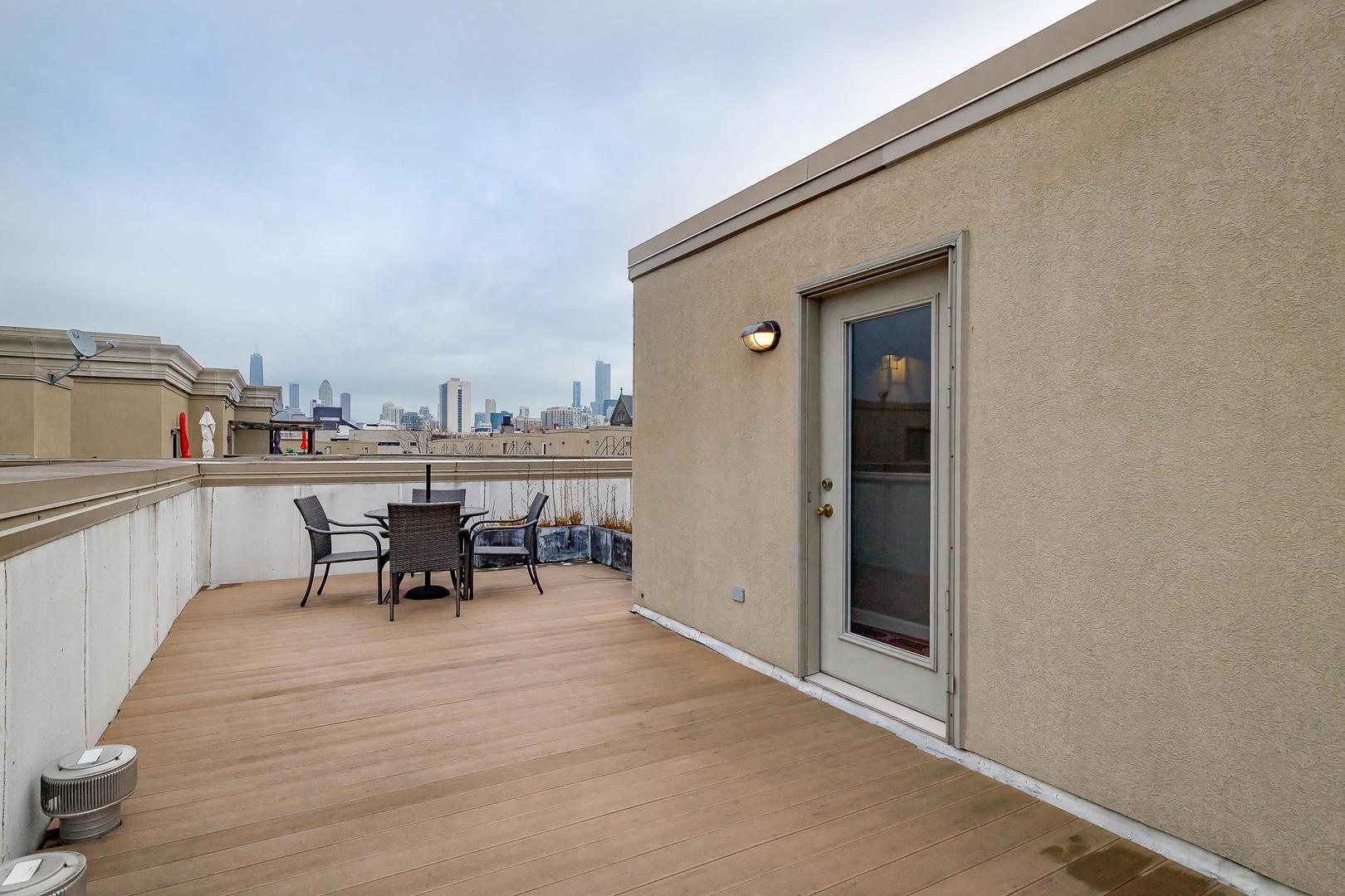 847 North May Street Chicago, IL 60642 - Photo 27 of 32 an outdoor space with furniture