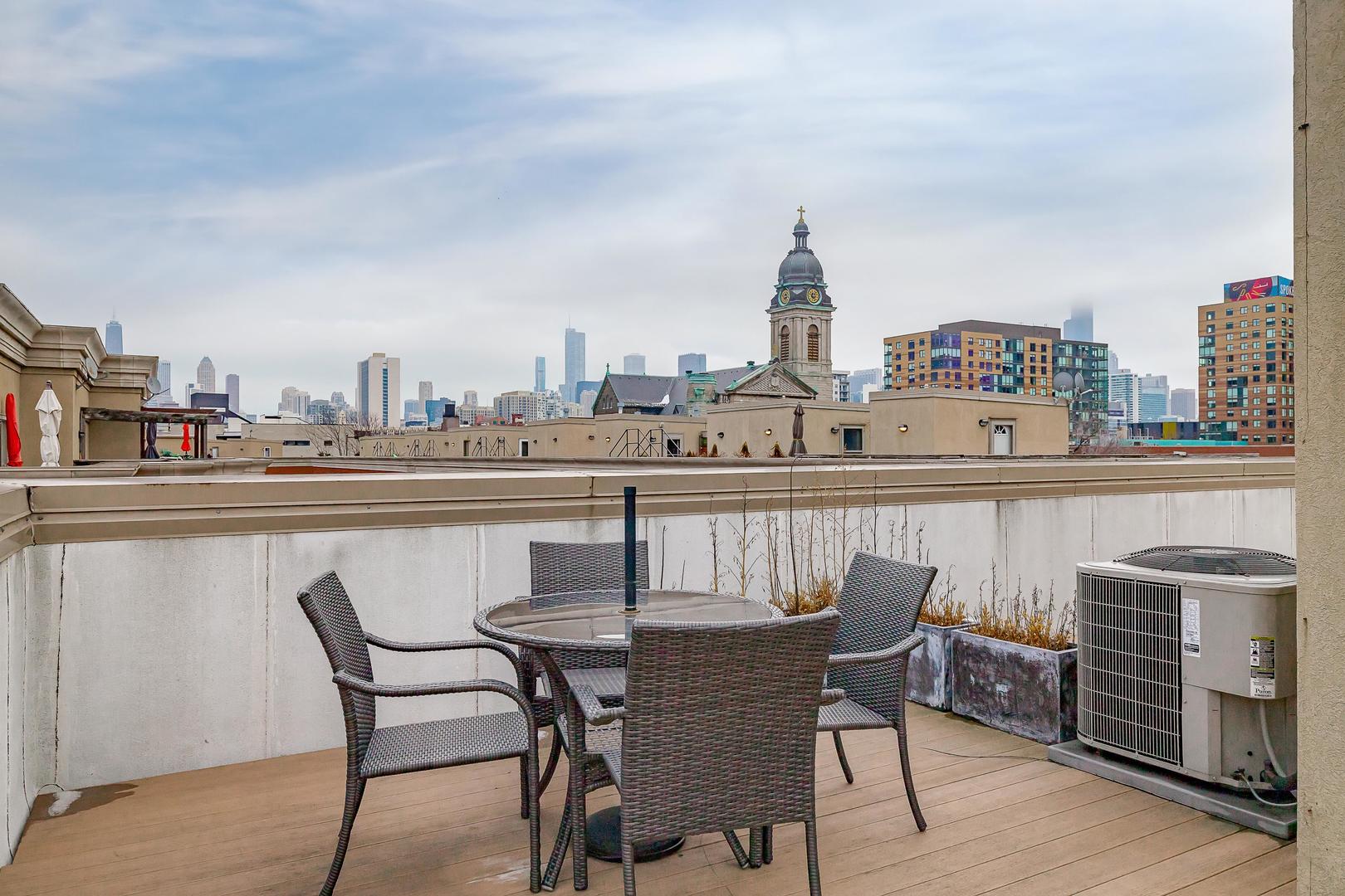 847 North May Street Chicago, IL 60642 - Photo 28 of 32 a view of a terrace with sitting area