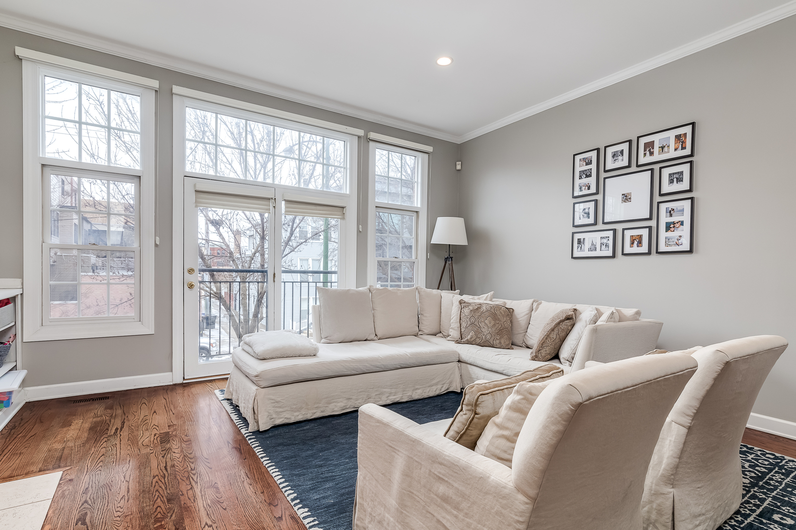 847 North May Street Chicago, IL 60642 - Photo 8 of 32 a living room with furniture and a large window
