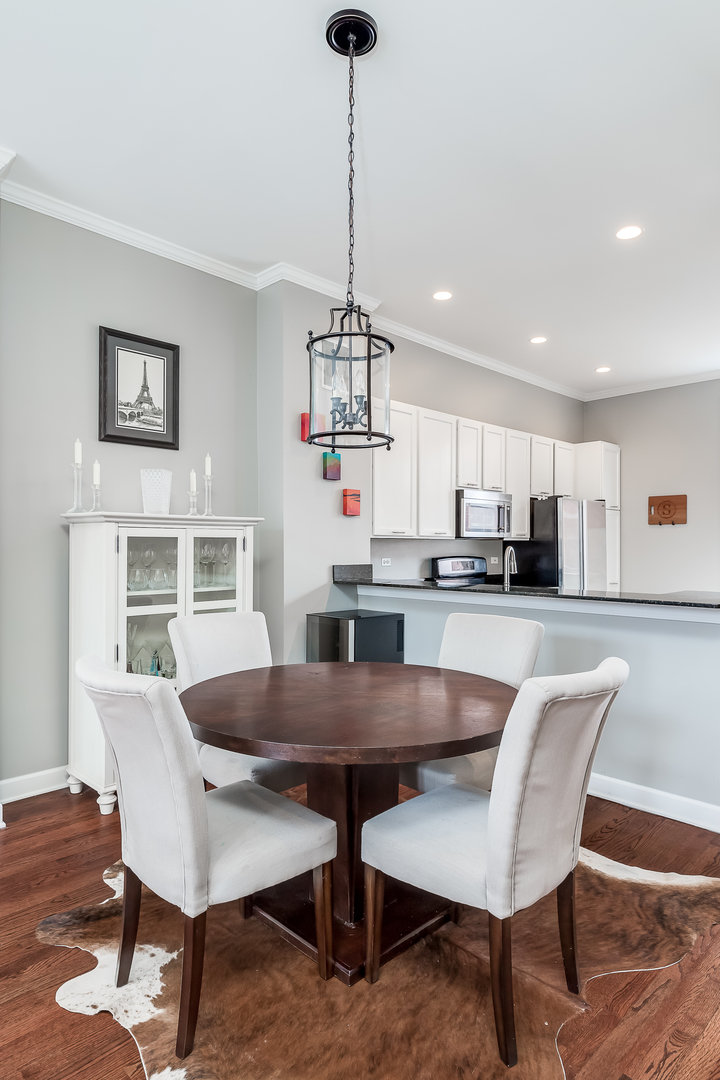 847 North May Street Chicago, IL 60642 - Photo 10 of 32 a view of a dining room with furniture