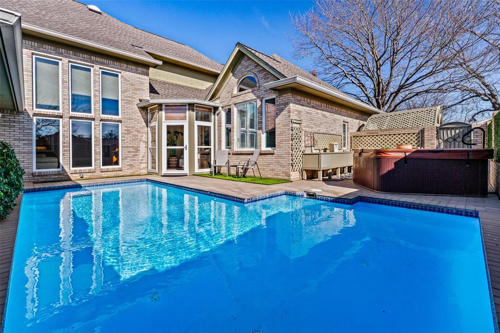 8908 Brierfield Road Granbury, TX 76049 - Photo 30 of 40 a view of a house with pool and wooden floor