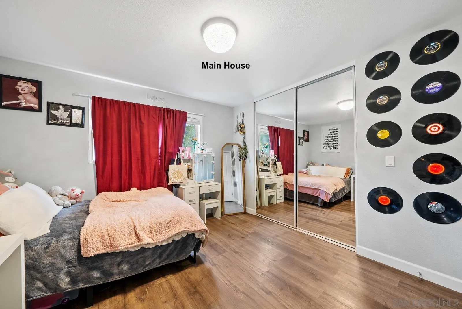 21908 Japatul Lane Alpine, CA 91901 - Photo 11 of 47 a bedroom with bed and cabinets