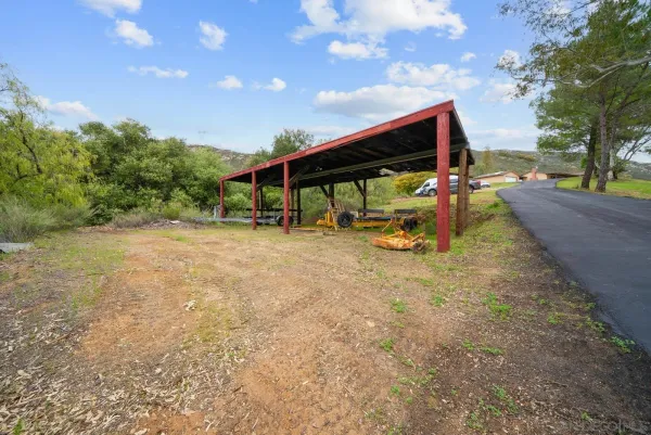 a view of outdoor space with playground and green space