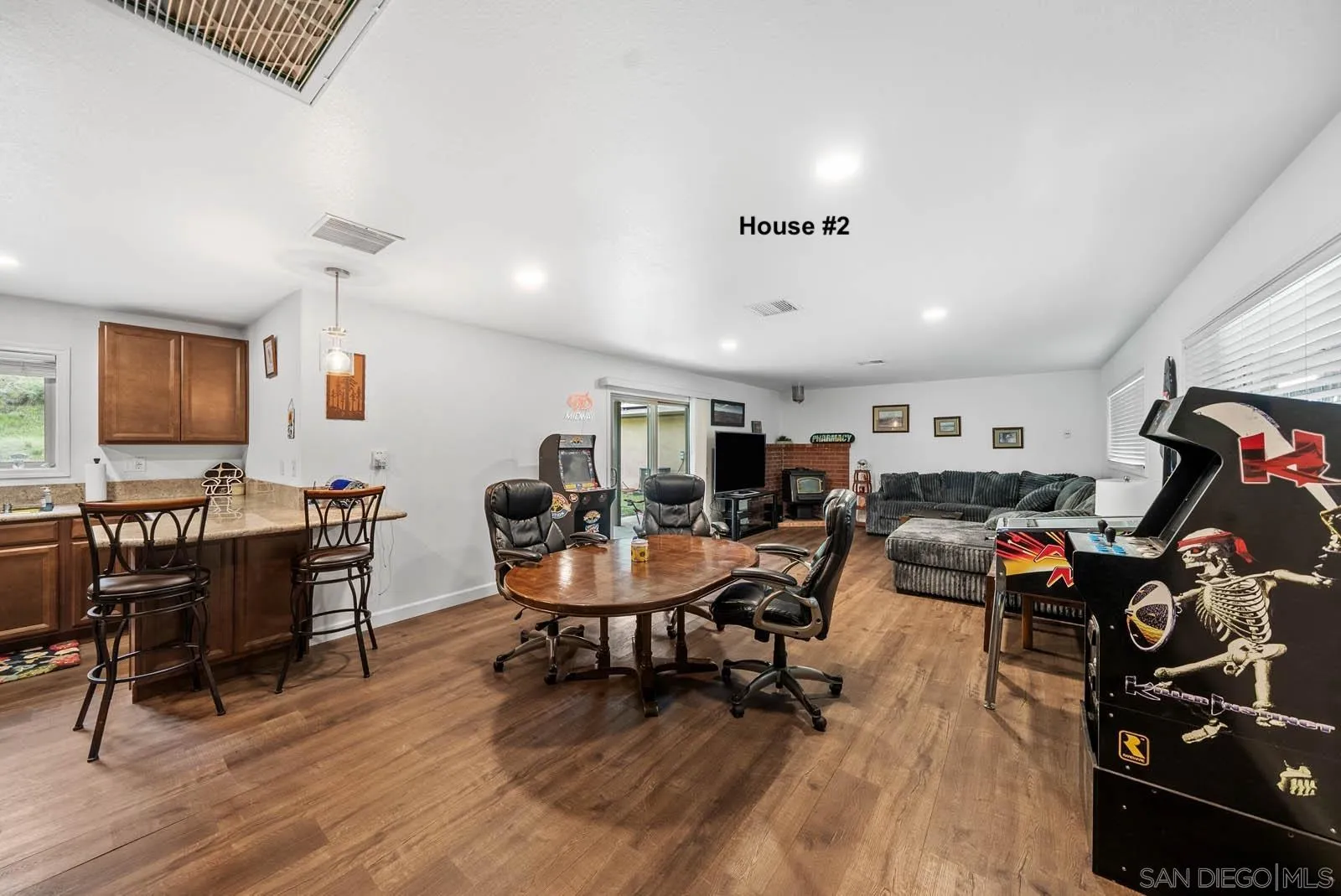 21908 Japatul Lane Alpine, CA 91901 - Photo 22 of 47 a living room with furniture and a wooden floor