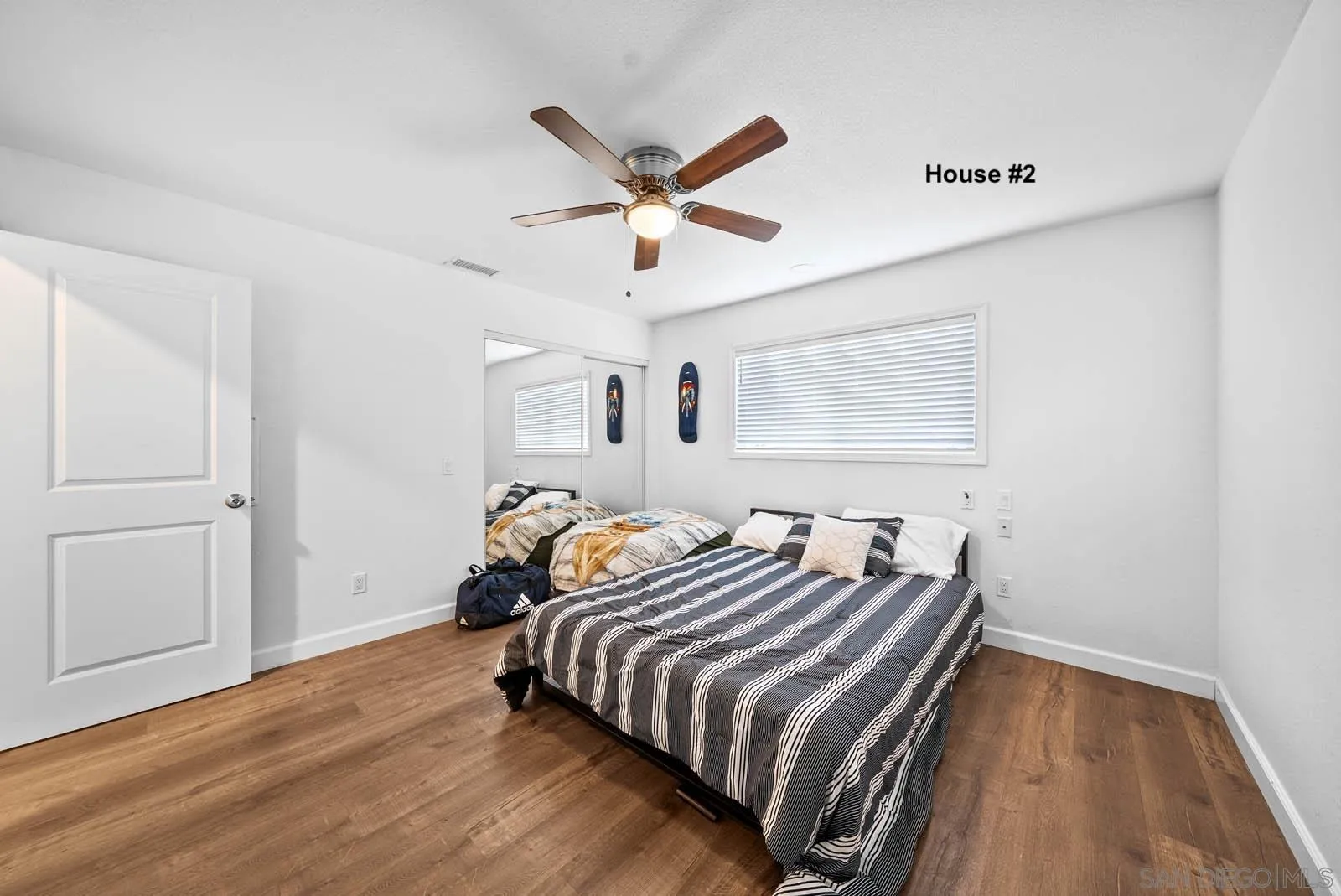 21908 Japatul Lane Alpine, CA 91901 - Photo 27 of 47 a bedroom with bed and a window