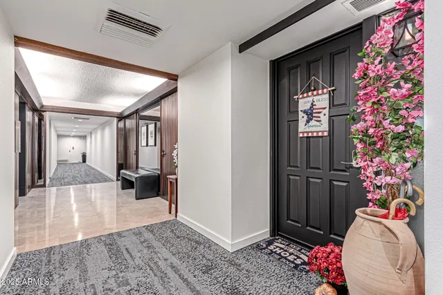 a view of livingroom with furniture and toys