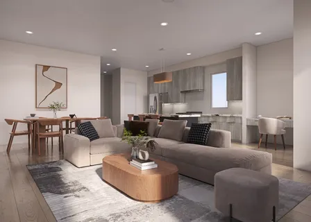 a living room with furniture kitchen and a table