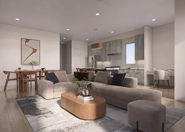 a living room with furniture kitchen and a table