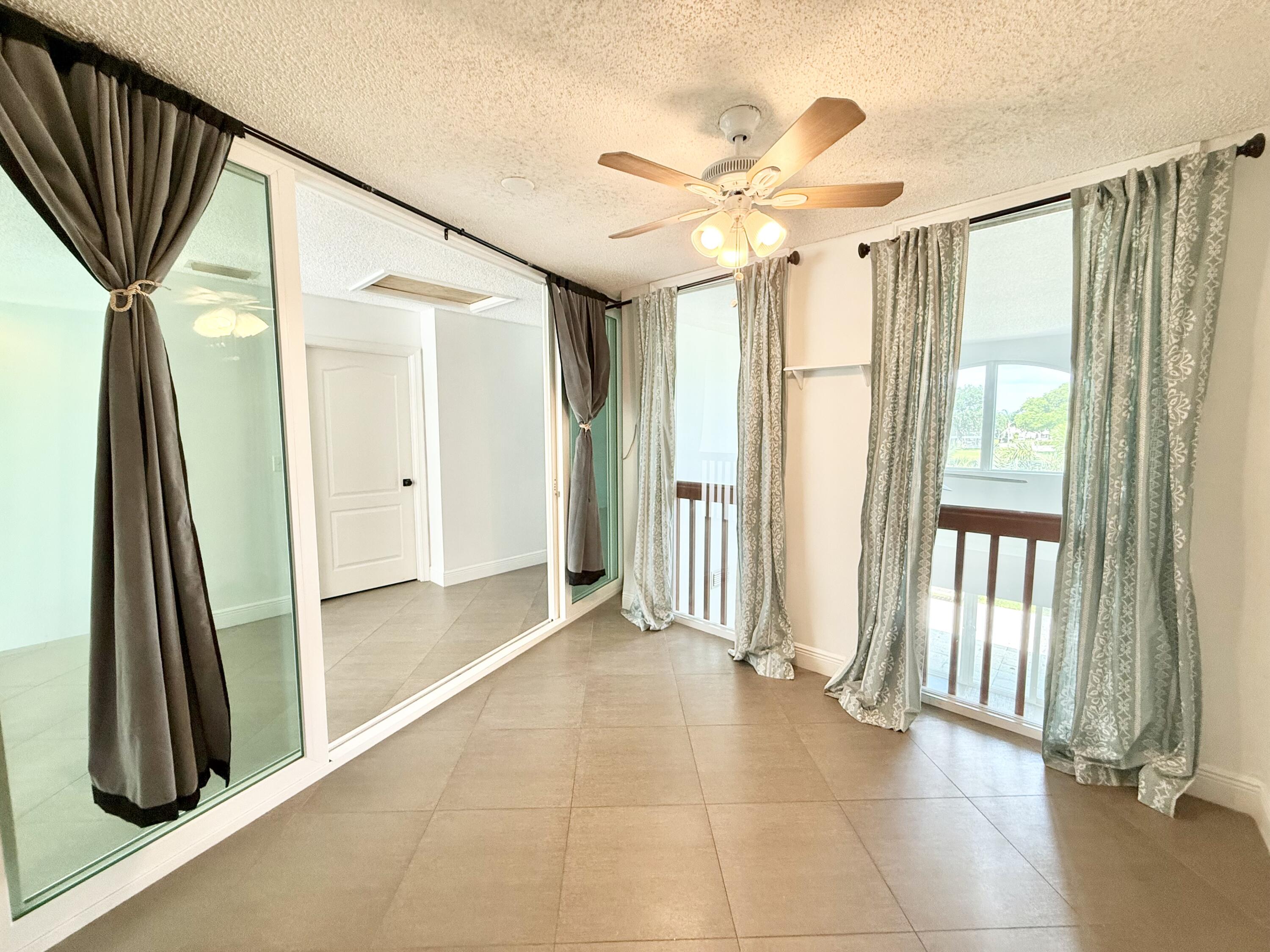 9190 Boca Gardens Parkway, Unit B Boca Raton, FL 33496 - Photo 24 of 35 a view of a hallway with entryway