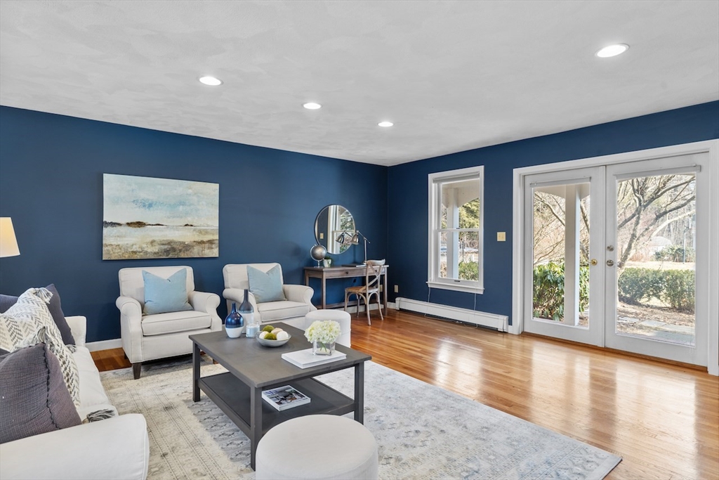5 Madison Lane Acton, MA 01720 - Photo 11 of 26 a living room with furniture and large windows