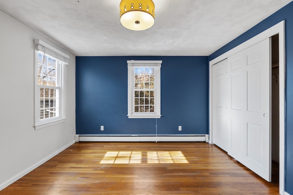 5 Madison Lane Acton, MA 01720 - Photo 19 of 26 an empty room with windows