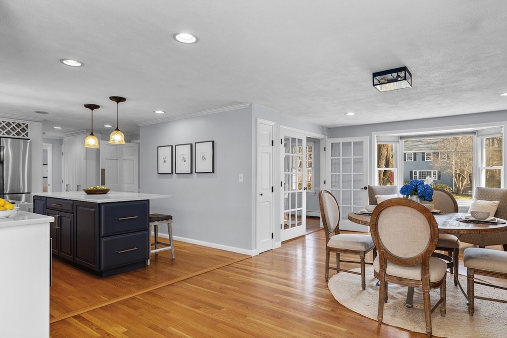 5 Madison Lane Acton, MA 01720 - Photo 5 of 26 a view of a dining room with furniture and wooden floor