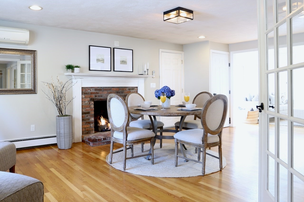 5 Madison Lane Acton, MA 01720 - Photo 6 of 26 a living room with furniture and a fireplace