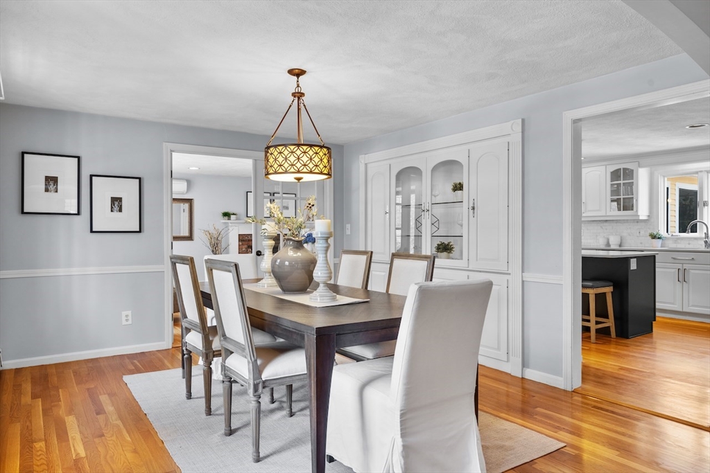 5 Madison Lane Acton, MA 01720 - Photo 9 of 26 a view of a dining room with furniture window and wooden floor