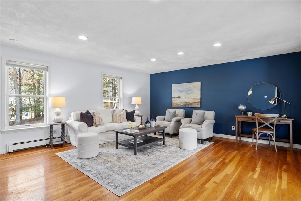 5 Madison Lane Acton, MA 01720 - Photo 10 of 26 a living room with furniture and wooden floor