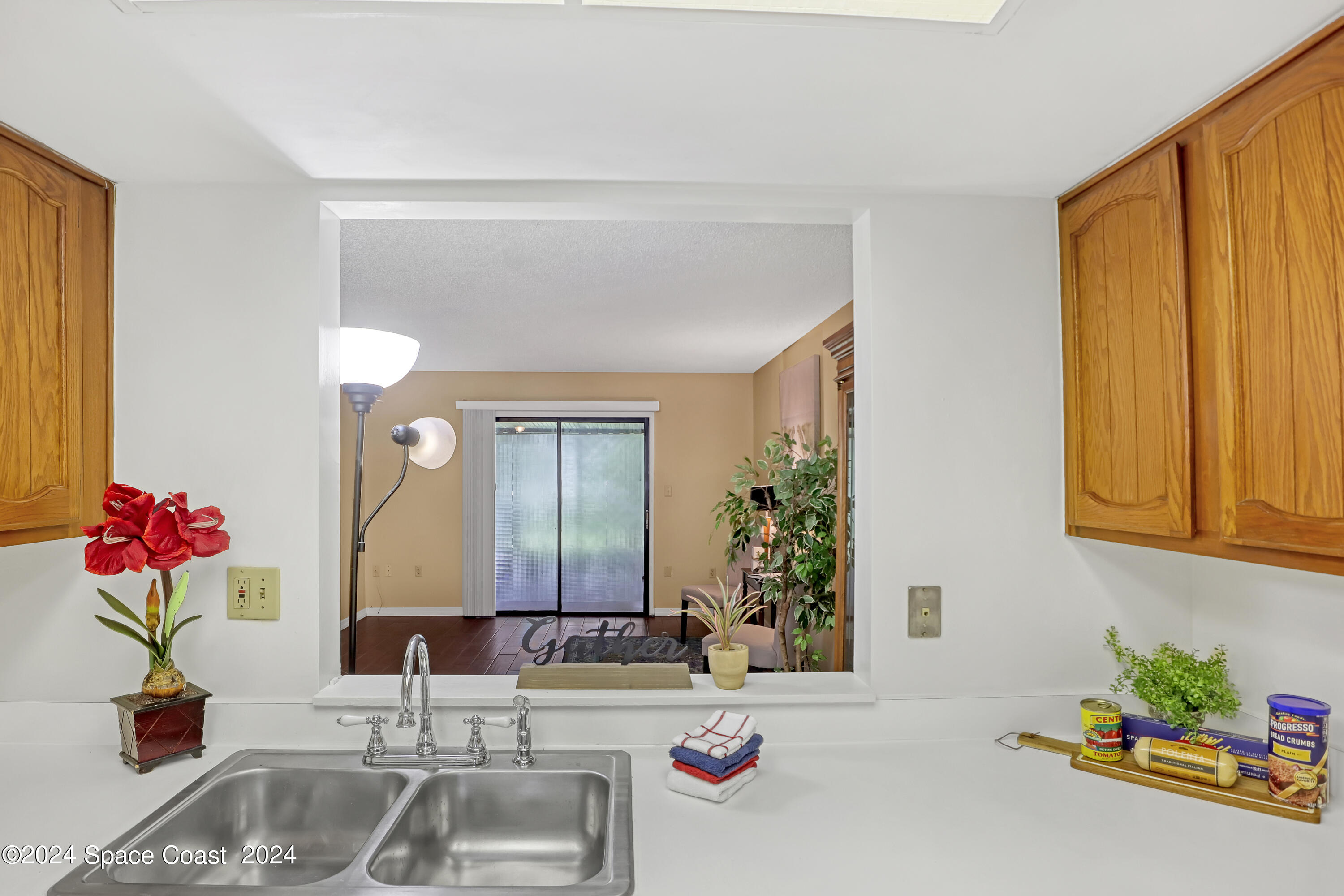 4733 Sisson Road Titusville, FL 32780 - Photo 11 of 26 a bathroom with a sink and a mirror