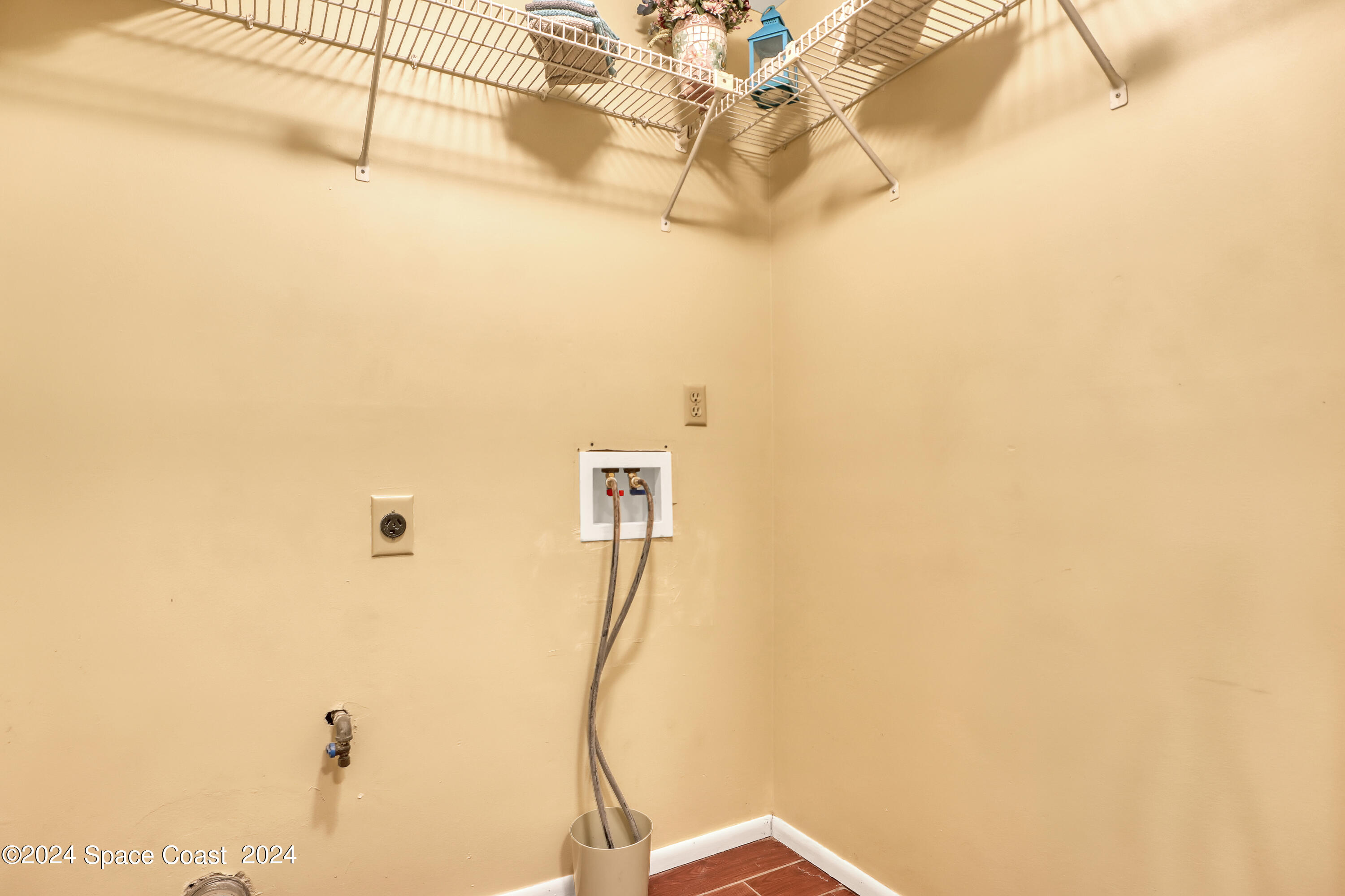 4733 Sisson Road Titusville, FL 32780 - Photo 15 of 26 a view of a room with a wall