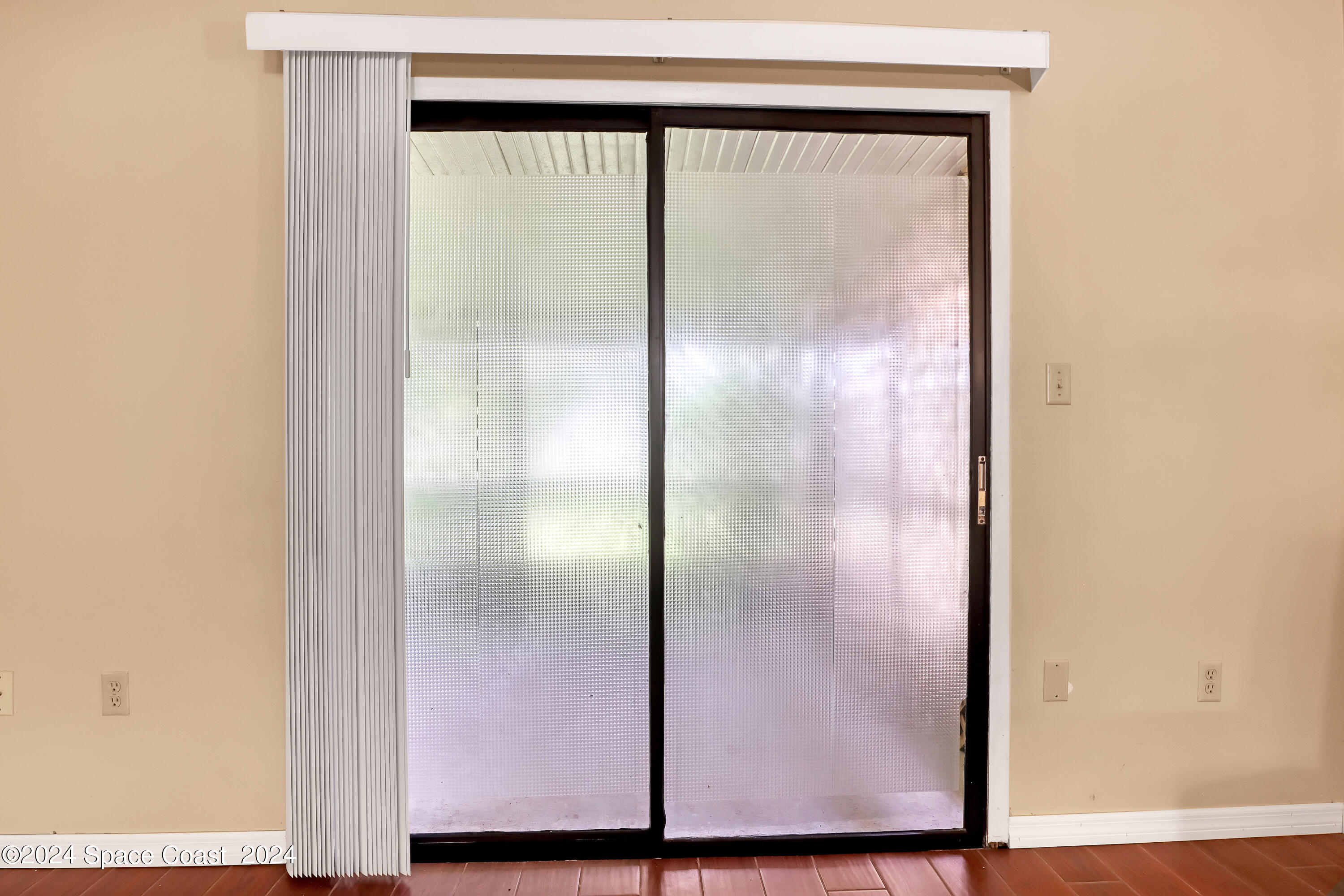 4733 Sisson Road Titusville, FL 32780 - Photo 21 of 26 a bathroom with a glass shower door