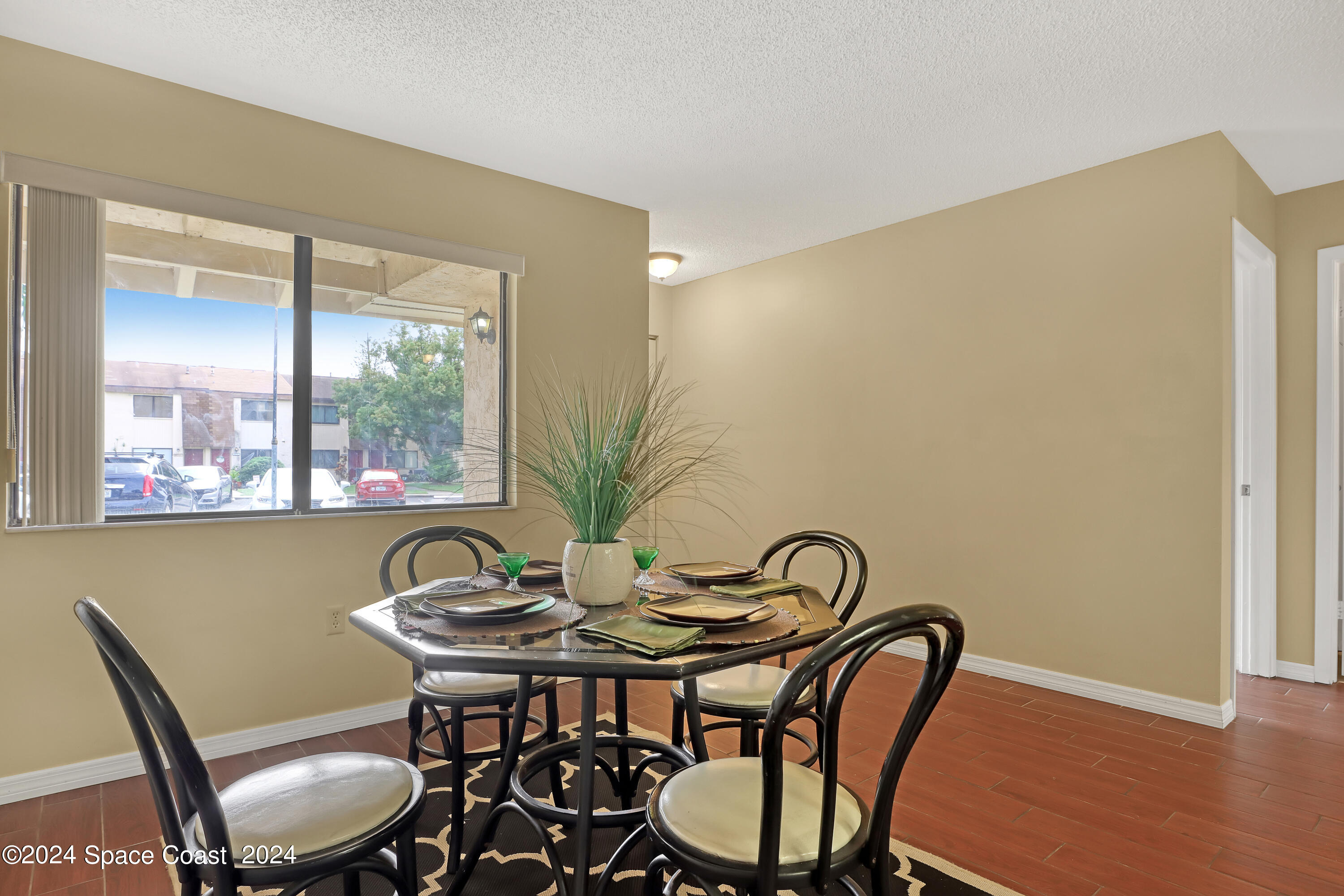 4733 Sisson Road Titusville, FL 32780 - Photo 6 of 26 a view of a dining room with furniture and window