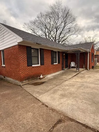 a view of a house with a patio