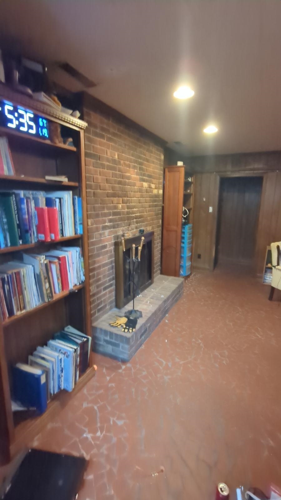1026 Wingfield Road Memphis, TN 38122 - Photo 13 of 19 a view of a livingroom with furniture and a bookshelf