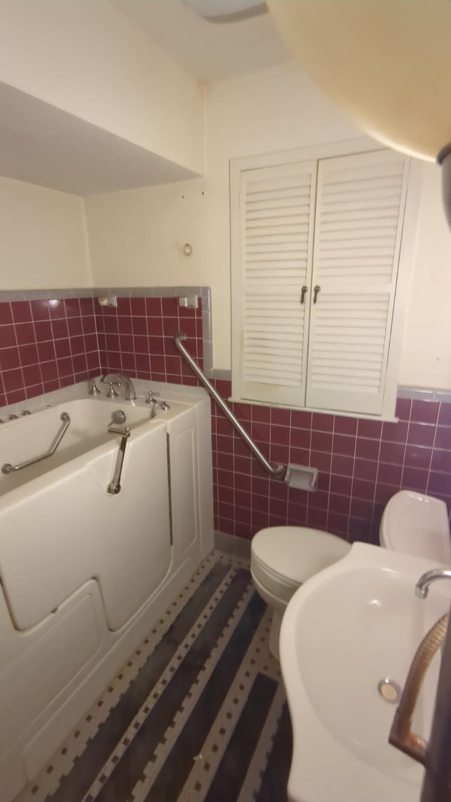 1026 Wingfield Road Memphis, TN 38122 - Photo 17 of 19 a bathroom with a sink and a blue shower