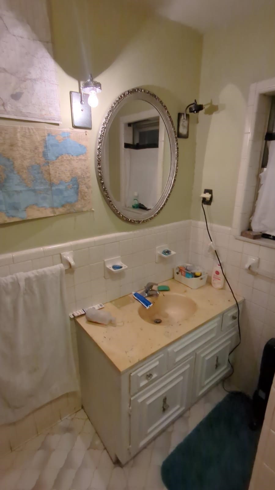 1026 Wingfield Road Memphis, TN 38122 - Photo 19 of 19 a utility room with a sink and mirror