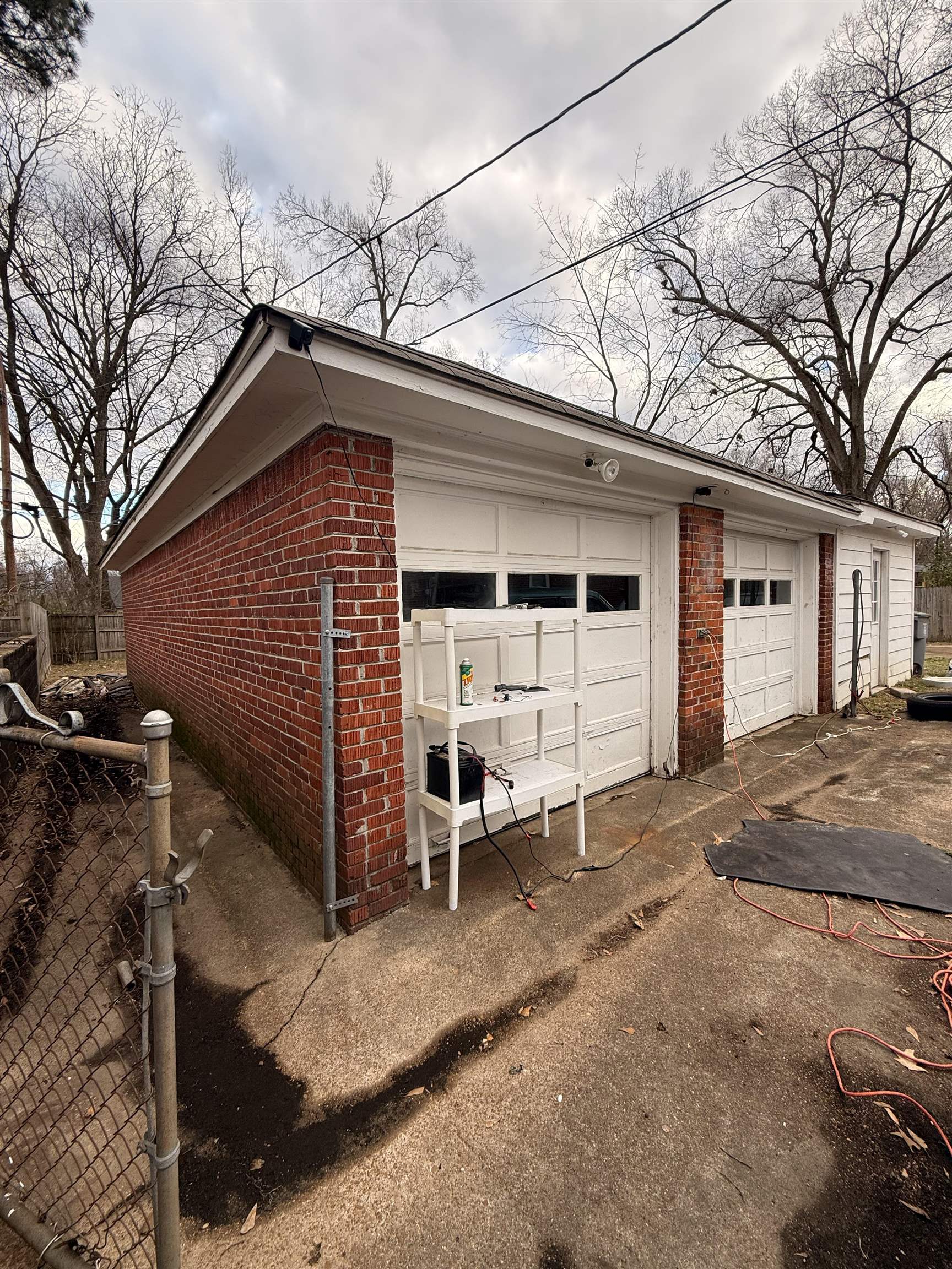 1026 Wingfield Road Memphis, TN 38122 - Photo 5 of 19 a backyard of a house with barbeque oven and brick wall