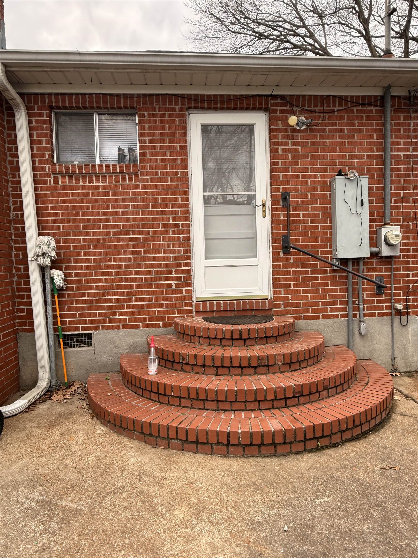 1026 Wingfield Road Memphis, TN 38122 - Photo 6 of 19 a view of a brick house with windows