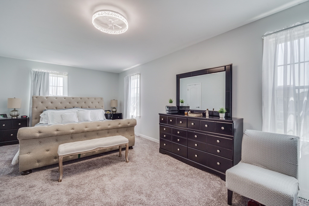 283 Christopher Drive Springfield, MA 01119 - Photo 20 of 32 a living room with furniture and a window