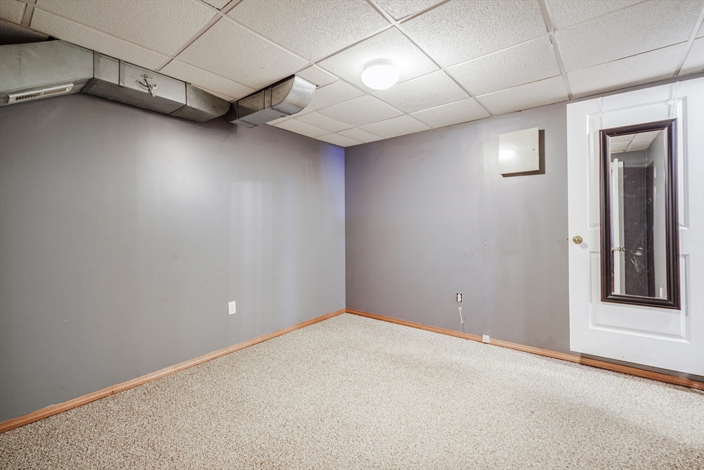 283 Christopher Drive Springfield, MA 01119 - Photo 27 of 32 an empty room with windows