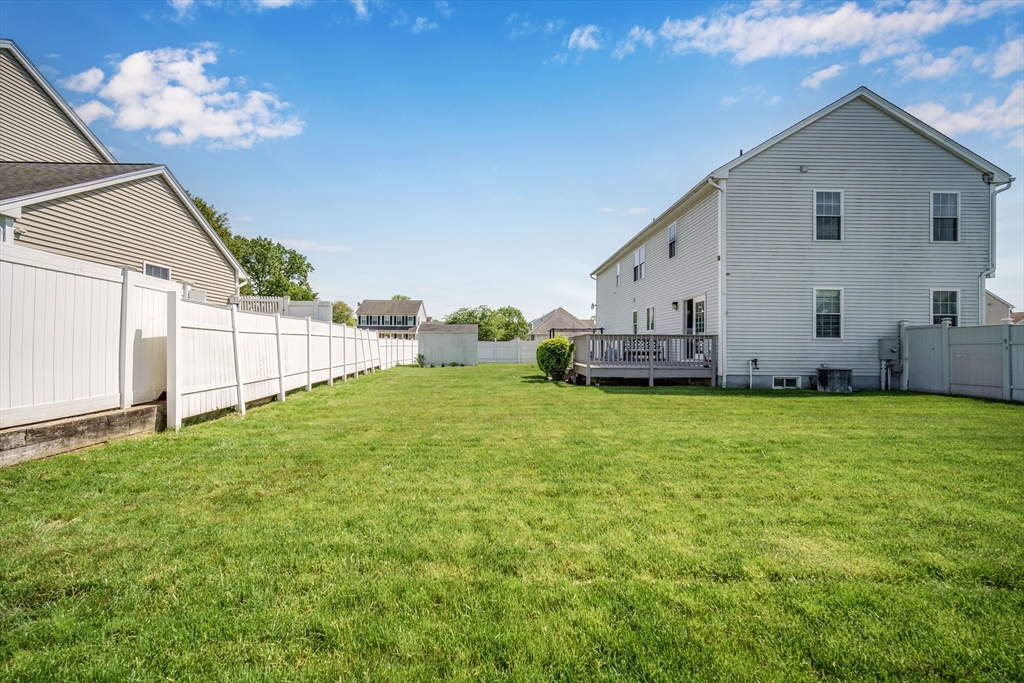283 Christopher Drive Springfield, MA 01119 - Photo 31 of 32 a view of a house with backyard