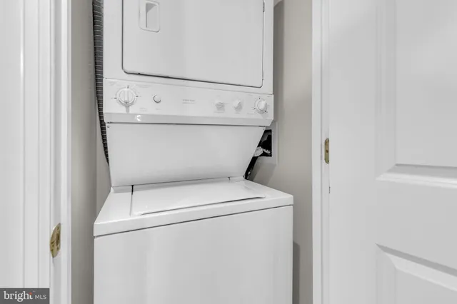 a spacious bathroom with a double vanity sink and a mirror