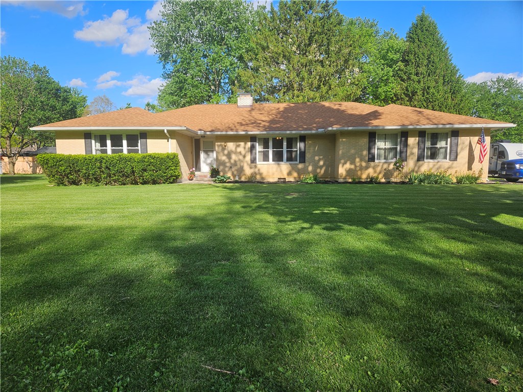 3998 Willowcrest Road Beavercreek, OH 45430 - Photo 1 of 41 A classic ranch home with a lush green lawn awaits its new owners.
