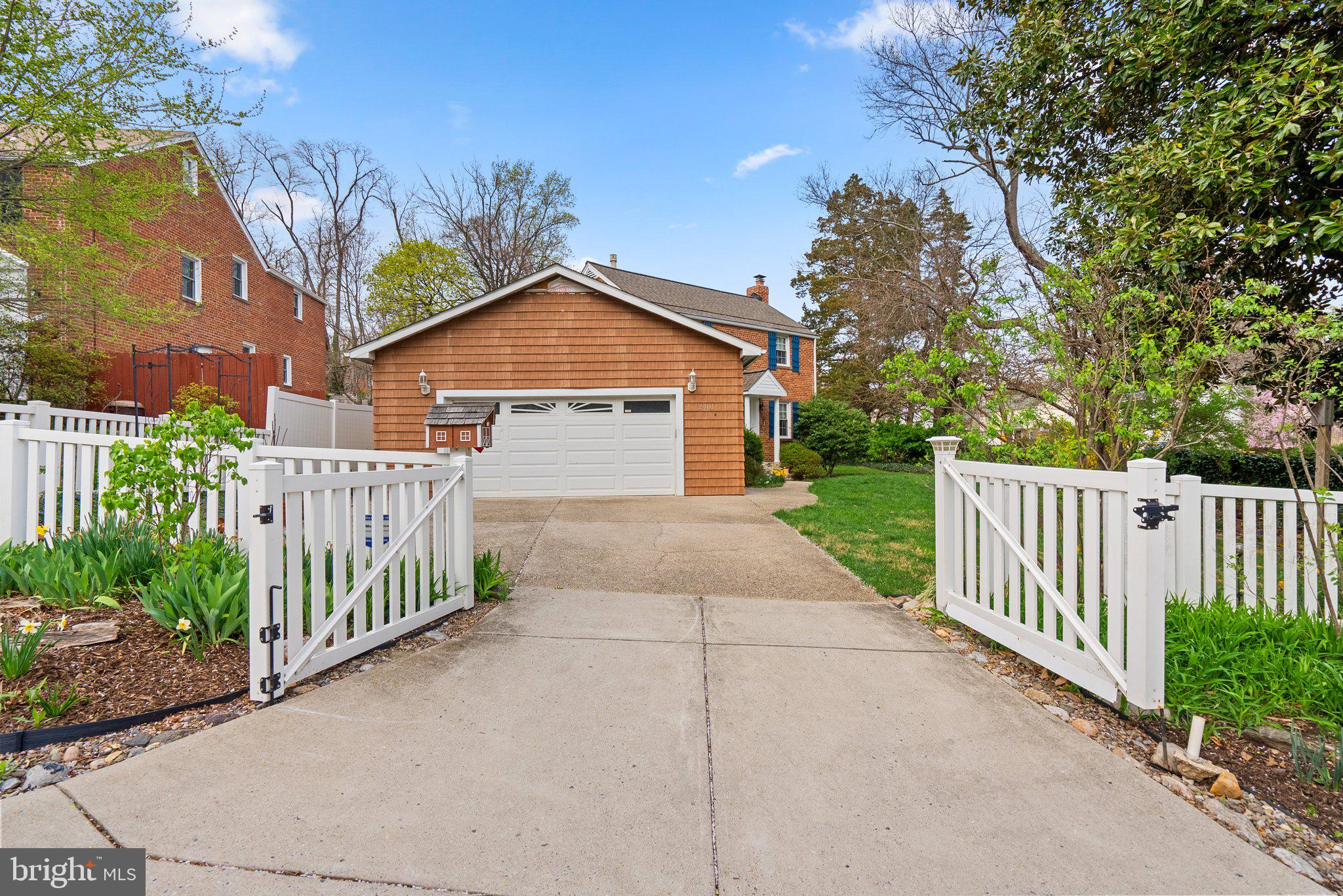 2401 Hayden Drive Silver Spring, MD 20902 - Photo 38 of 44 a front view of a house with garden