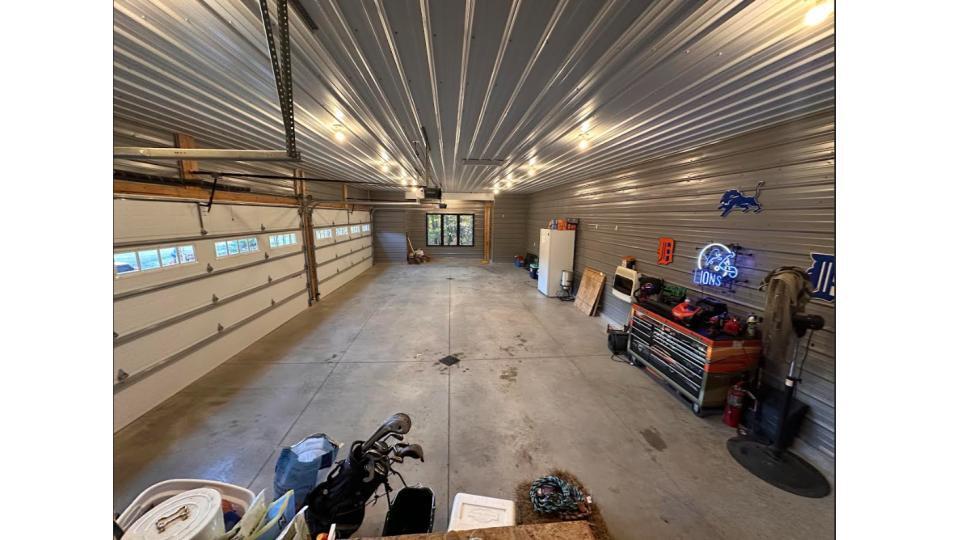 4390 22 Mile Road Northwest Grant, MI 49327 - Photo 37 of 85 garage interior