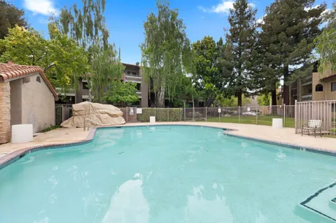 a view of outdoor space yard and swimming pool