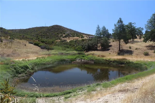 a view of a lake with mountains in the background