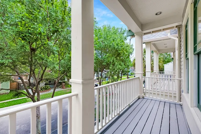 a view of a pathway of a house with wooden floor