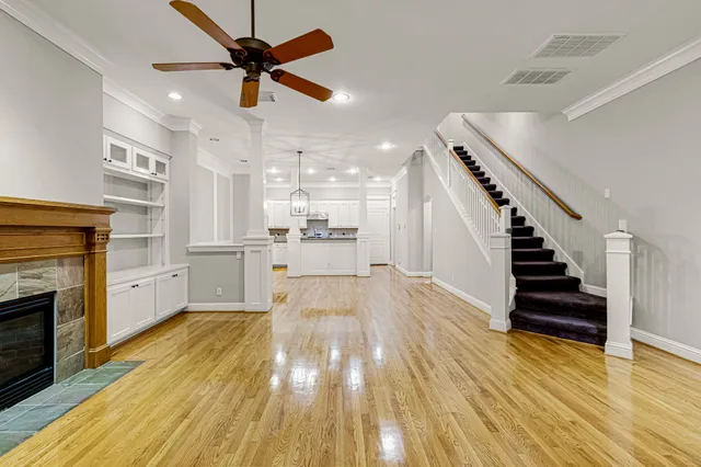 a view of kitchen with furniture and wooden floor