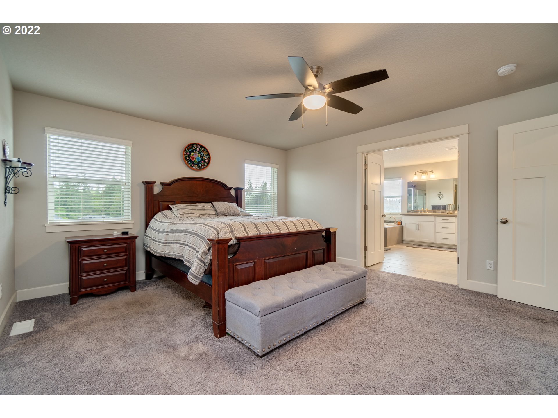 4817 South 18th Drive Ridgefield, WA 98642 - Photo 18 of 30 a bedroom with a bed and window