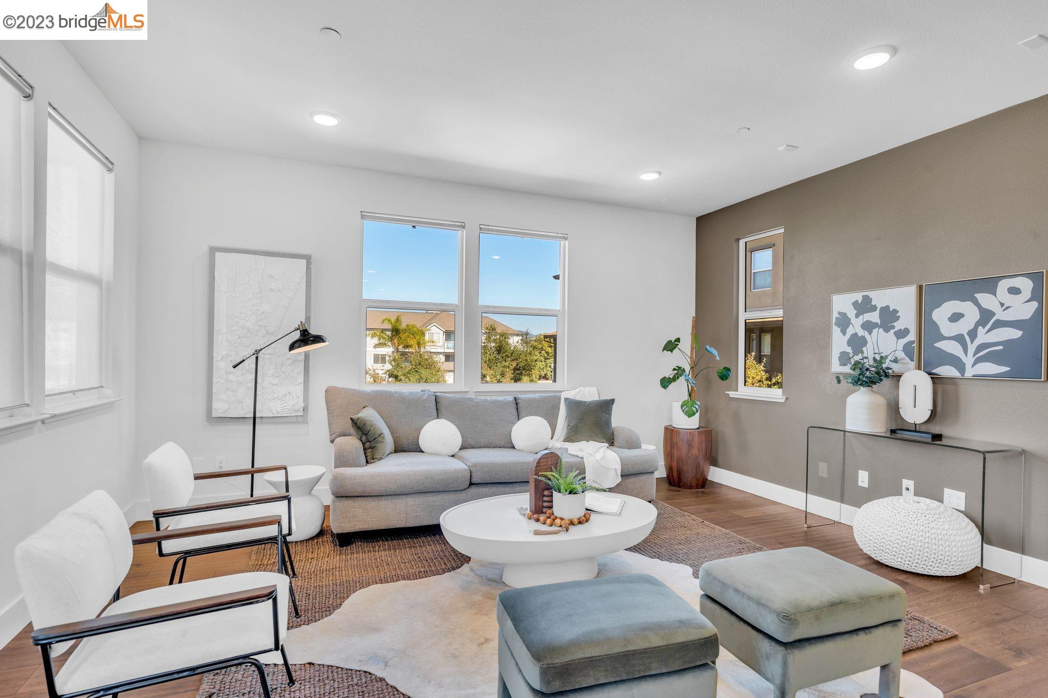 480 Diller Street Alameda, CA 94501 - Photo 1 of 1 a living room with furniture and a wooden floor