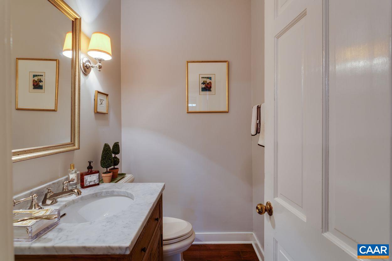 1310 Blue Ridge Road Charlottesville, VA 22903 - Photo 19 of 50 a bathroom with a sink toilet and vanity