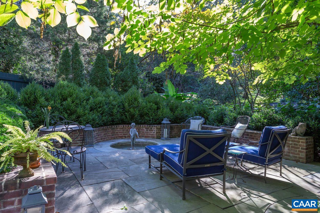 1310 Blue Ridge Road Charlottesville, VA 22903 - Photo 31 of 50 a view of a backyard with sitting area